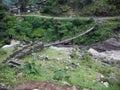 Suspension Bridge over River in Rural Himalayas Royalty Free Stock Photo