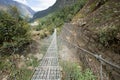 Suspension bridge over the river in Sagarmatha National Park Royalty Free Stock Photo