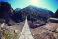 Suspension bridge over the river in Sagarmatha National Park Royalty Free Stock Photo