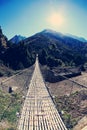 Suspension bridge over the river in Sagarmatha National Park Royalty Free Stock Photo
