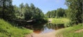 Suspension bridge on the river, Novgorod region, R