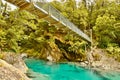 Suspension bridge on the scenic Blue Pools Nature Trail - Mount Aspiring National Park, New Zealand Royalty Free Stock Photo