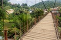 Suspension foot bridge in Muang Khua town, La