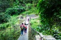 Suspension metal bridge in Annapurna trekking road, Nepal. Royalty Free Stock Photo