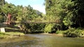 Suspention bridge over the river Royalty Free Stock Photo