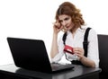 Suspicious businesswoman with credit card Royalty Free Stock Photo