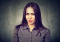 Suspicious doubtful young woman Royalty Free Stock Photo