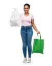 woman comparing reusable and plastic bags