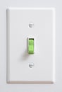 Sustainable clean, green energy light switch Royalty Free Stock Photo