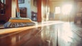 sustainable cleaning. Cleaning Wooden Floor with Mop in Sunlit Room. wooden floor being cleaned with a blue mop Royalty Free Stock Photo