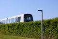 Sustainable driverless modern light rail metro train on railroad track in Europe Royalty Free Stock Photo