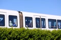 Sustainable driverless modern light rail metro train on railroad track in Europe Royalty Free Stock Photo