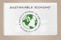 Sustainable economy diagram on note book, make, use, reuse, repair, recycle resources for sustainable consumption