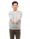 smiling boy with toy wind turbine Royalty Free Stock Photo