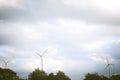 Sustainable energy production from natural renewable resources. Wind farms and turbines Royalty Free Stock Photo