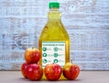 Sustainable food, ethical eco food labels on bottle of apple juice Royalty Free Stock Photo