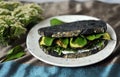 Sustainable green diet conceptual image with black charcoal bread and veggie sandwich