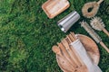 Sustainable lifestyle. Zero waste, plastic free, recycling concept. Stainless steel cup, wooden spoon, fork, knife Royalty Free Stock Photo