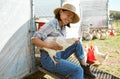 Sustainable, livestock and woman with chicken on a farm doing work in a eco friendly, organic or agro field. Agriculture