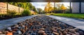 Sustainable permeable driveway and walkway construction with ecofriendly water drainage system. Royalty Free Stock Photo
