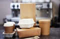 Sustainable Recyclable Takeaway Food Packaging On Counter In Coffee Shop