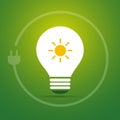 Sustainable Resources, Renewable, Reusable Alternative Green Solar Energy Concept with Bright Glowing Light Bulb,Sun Symbol Inside Royalty Free Stock Photo