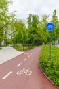 Sustainable transport. Blue road sign or signal of bicycle lane Royalty Free Stock Photo