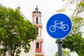 Sustainable transport. Blue road sign or signal of bicycle lane Royalty Free Stock Photo