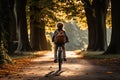 Sustainable travel. Rear view of a boy riding bicycle. Sustainable tourism and low carbon footprint. Eco-friendly journey to