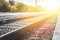 Sustainable traveling by train: Rail track and colorful, idyllic landscape in fall Royalty Free Stock Photo