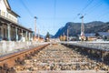 Sustainable traveling by train: Rail track and colorful, idyllic landscape in fall Royalty Free Stock Photo