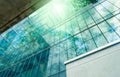 Sustainble green building. Eco-friendly building in modern city. Sustainable glass office building with tree for reducing carbon Royalty Free Stock Photo