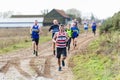 Sutton, Suffolk, UK December 15 2019: A adults over 18 cross country running race through a muddy countryside course