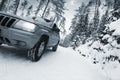 Suv, car, driving in snowy dangerous conditions Royalty Free Stock Photo