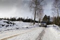 Suv, car, driving through snowy landscape Royalty Free Stock Photo