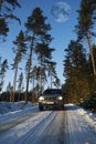 Suv, car driving in snowy terrain Royalty Free Stock Photo