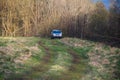 suv car in early spring forest Royalty Free Stock Photo