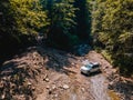 suv car mountains creek on background Royalty Free Stock Photo