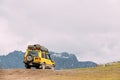 SUV Car On Off Road In Spring Mountains Landscape In Georgia. Drive Royalty Free Stock Photo