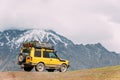 SUV Car On Off Road In Spring Mountains Landscape In Georgia. Drive Royalty Free Stock Photo