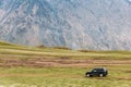 SUV Car On Off Road In Spring Mountains Landscape In Georgia. Landscape Royalty Free Stock Photo
