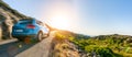 SUV car in spain mountain landscape road at sunset Royalty Free Stock Photo