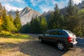 SUV on countryside road in High Tatra mountains Royalty Free Stock Photo
