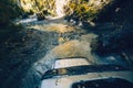 SUV cross the mountain river in forest. Gelendzhik, Russia