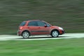 Suv driving on country road