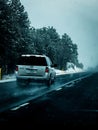 A SUV driving on the icy roads Royalty Free Stock Photo