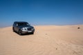 SUV four wheel drive vehicle car Al Qudra empty quarter seamless desert sahara Royalty Free Stock Photo