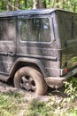 SUV got stuck in the mud in the forest, off-road Royalty Free Stock Photo
