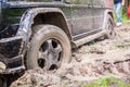 SUV got stuck in the mud in the forest, off-road Royalty Free Stock Photo