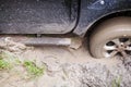 SUV got stuck in the mud, wheel closeup Royalty Free Stock Photo